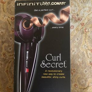 Infinity Pro Conhair Curl secret hair curler New but box it torn at top.